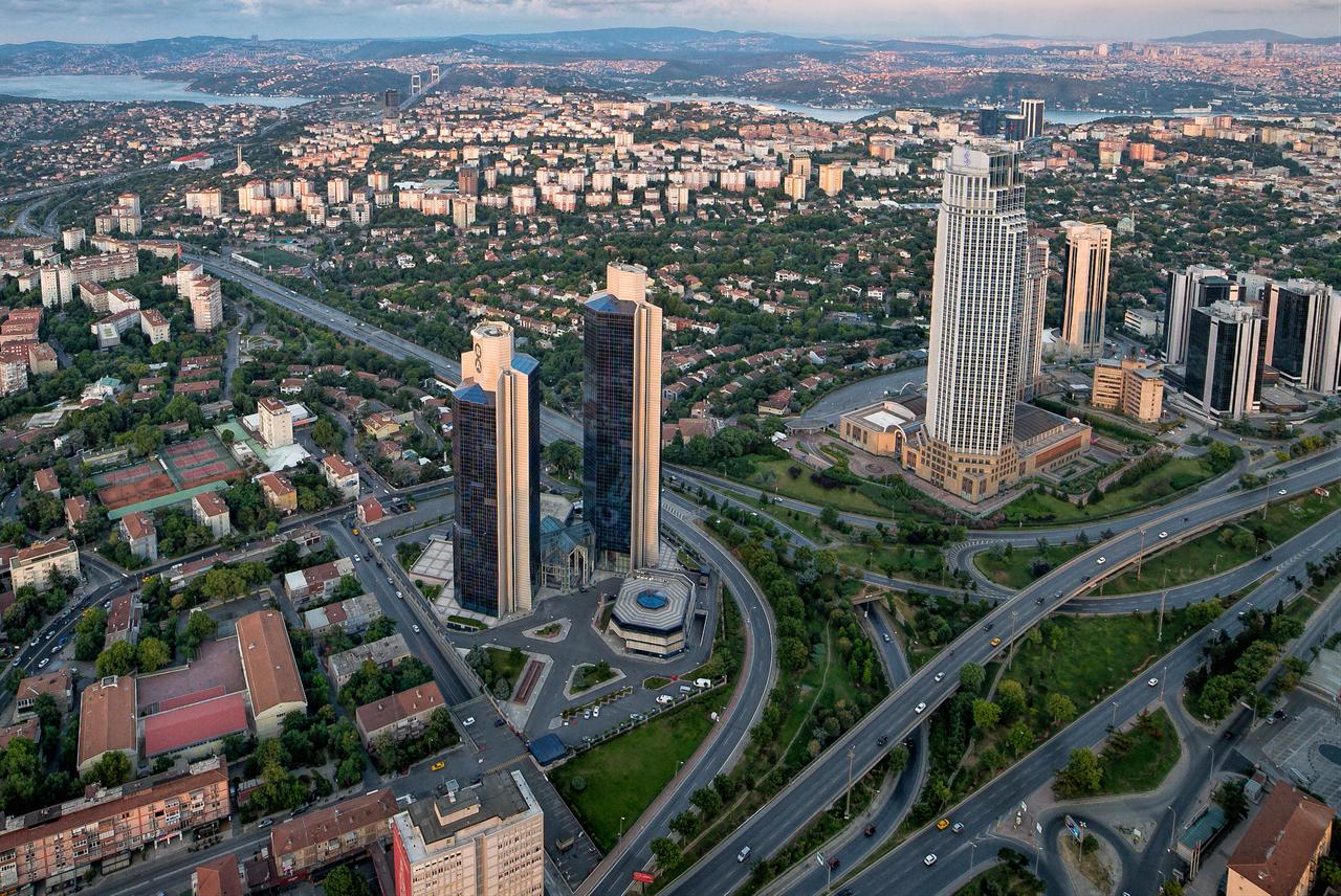 Aerial view of Sabanci Towers (left) and Isbank Tower (right) in Istanbul, Türkiye, July 6, 2015. (Adobe Stock Photo)