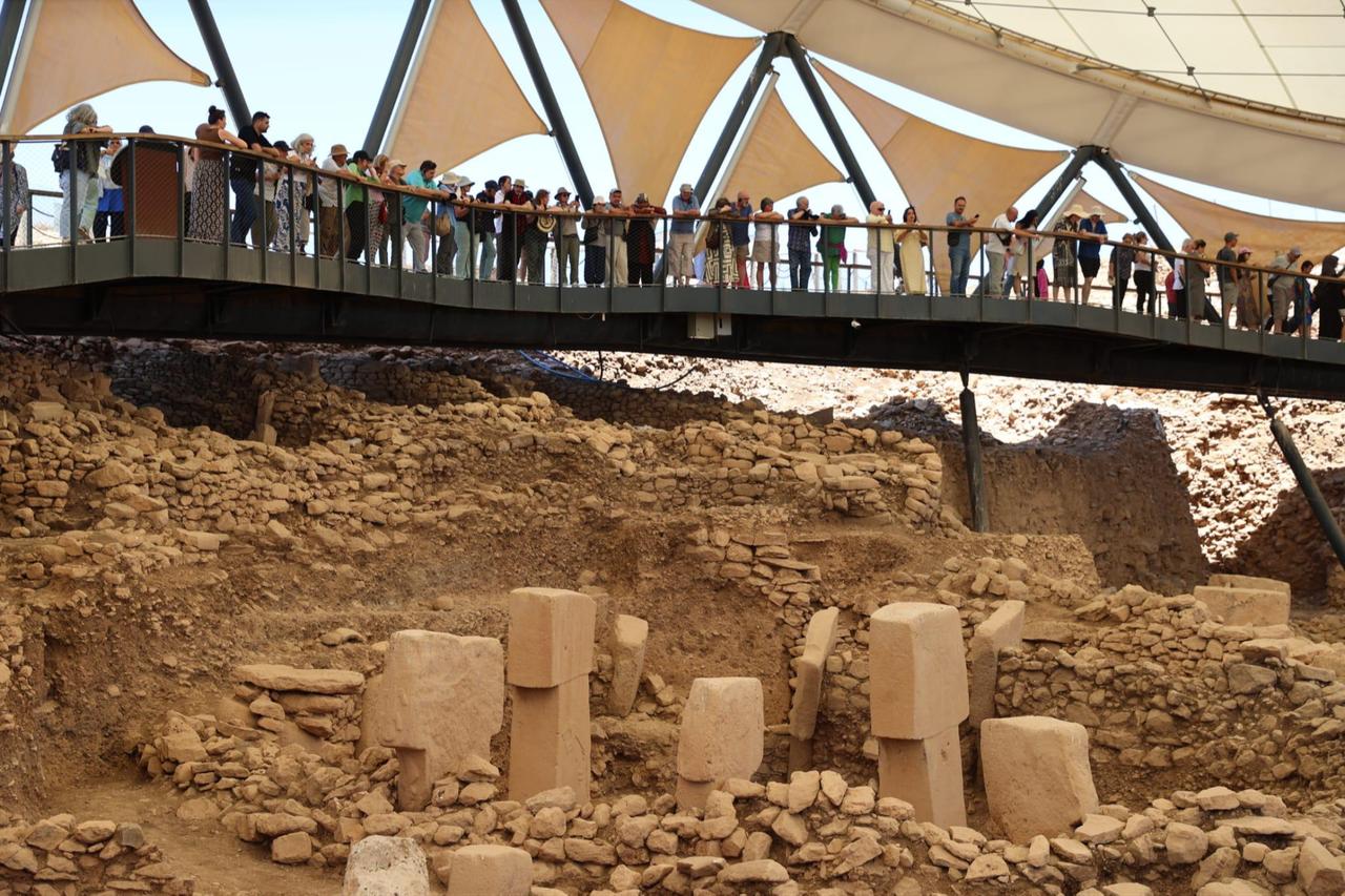 Visitors tour the ancient site of Gobeklitepe, a UNESCO World Heritage Site in Sanliurfa, Türkiye. (AA Photo)