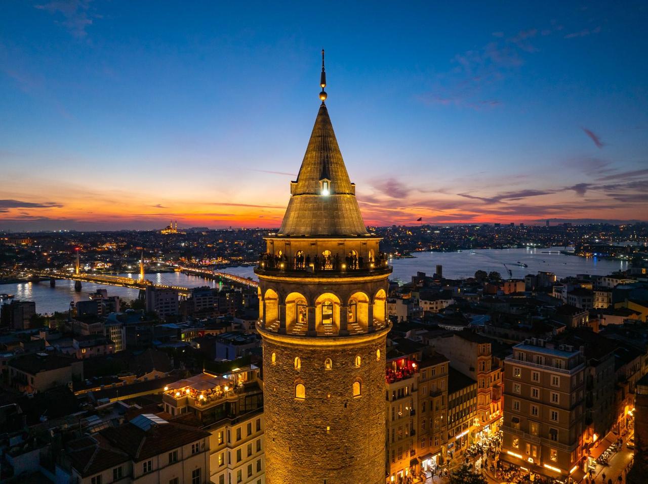 The Galata Tower illuminated at sunset, overlooking Istanbul’s skyline and the Golden Horn. (Photo via Ministry of Culture and Tourism)