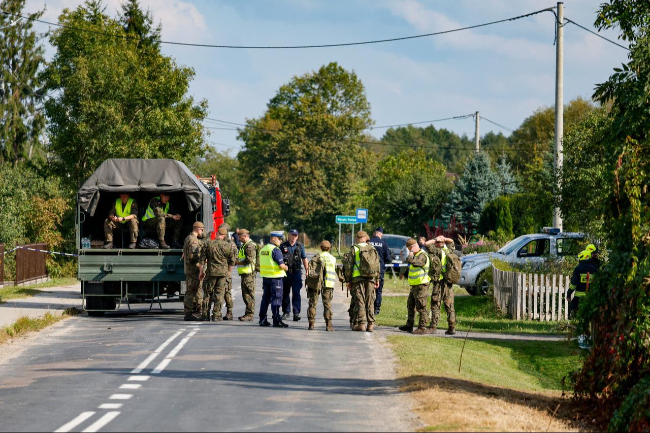 Police and army gather to inspect a house destroyed by debris from a shot-down Russian drone in the village of Wyryki-Wola, eastern Poland, on Sept. 10, 2025. (AFP Photo)
