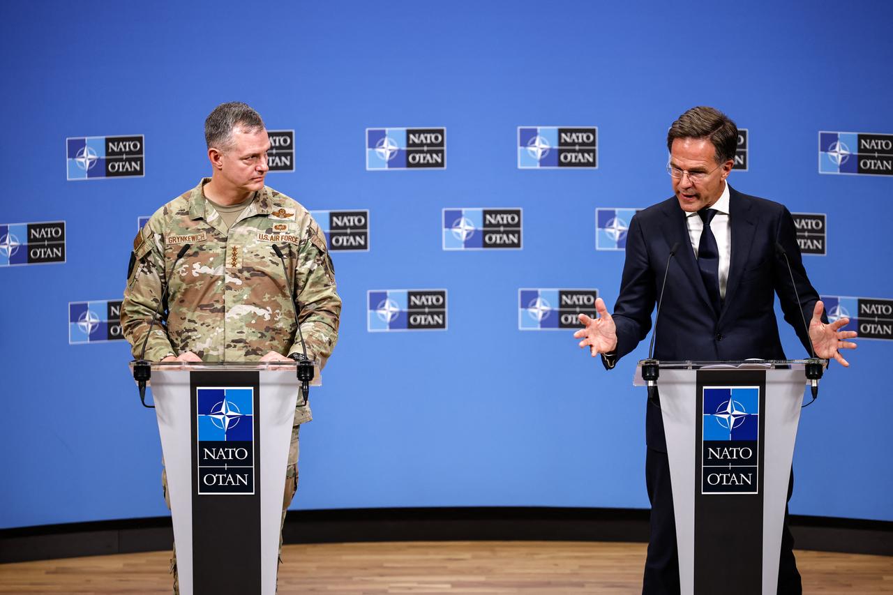NATO Secretary General Mark Rutte (R) and NATO Supreme Allied Commander Europe (SACEUR) General Alexus G. Grynkewich (L) speak during a joint press conference at the NATO headquarters in Brussels, September 12, 2025. (AFP Photo)