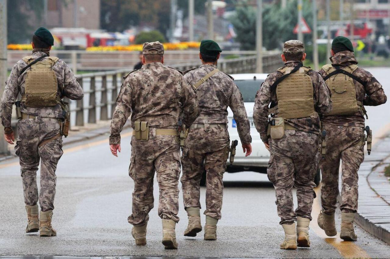 Members of Turkish Police Special Forces secure the area near the Interior Ministry following a bomb attack in Ankara, October 1, 2023. (AFP Photo)