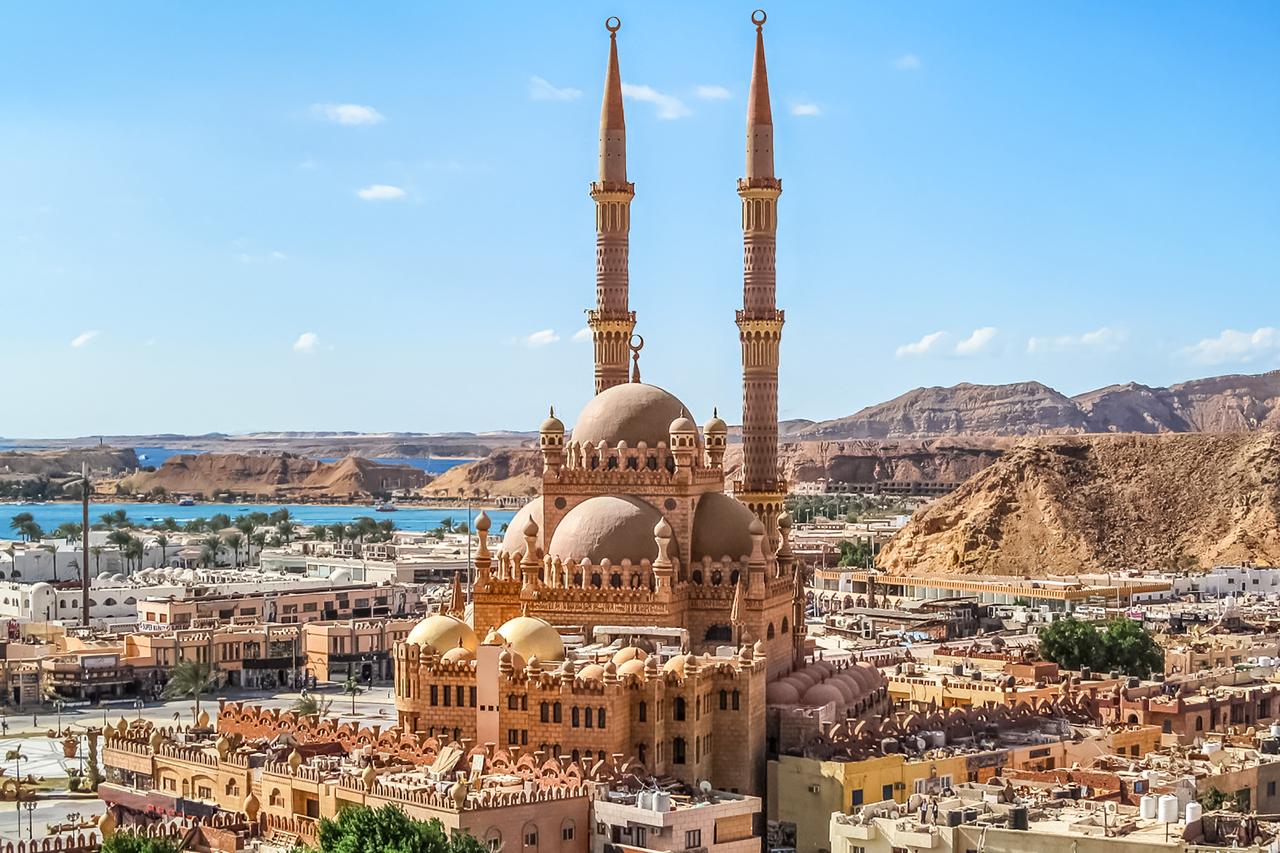 Aerial view showing the Old Market and Al Sahaba Mosque with the Red Sea in the background, Sharm El Sheikh, Egypt, September 12, 2025. (Adobe Stock Photo)