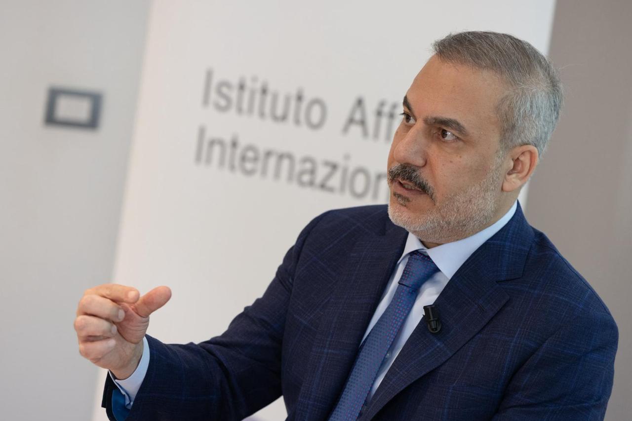 Foreign Minister Hakan Fidan (L) speaks at a conference organized by the Institute of International Affairs (IAI), in Rome, Italy, on Sept. 12, 2025. (Photo via Turkish Foreign Ministry)
