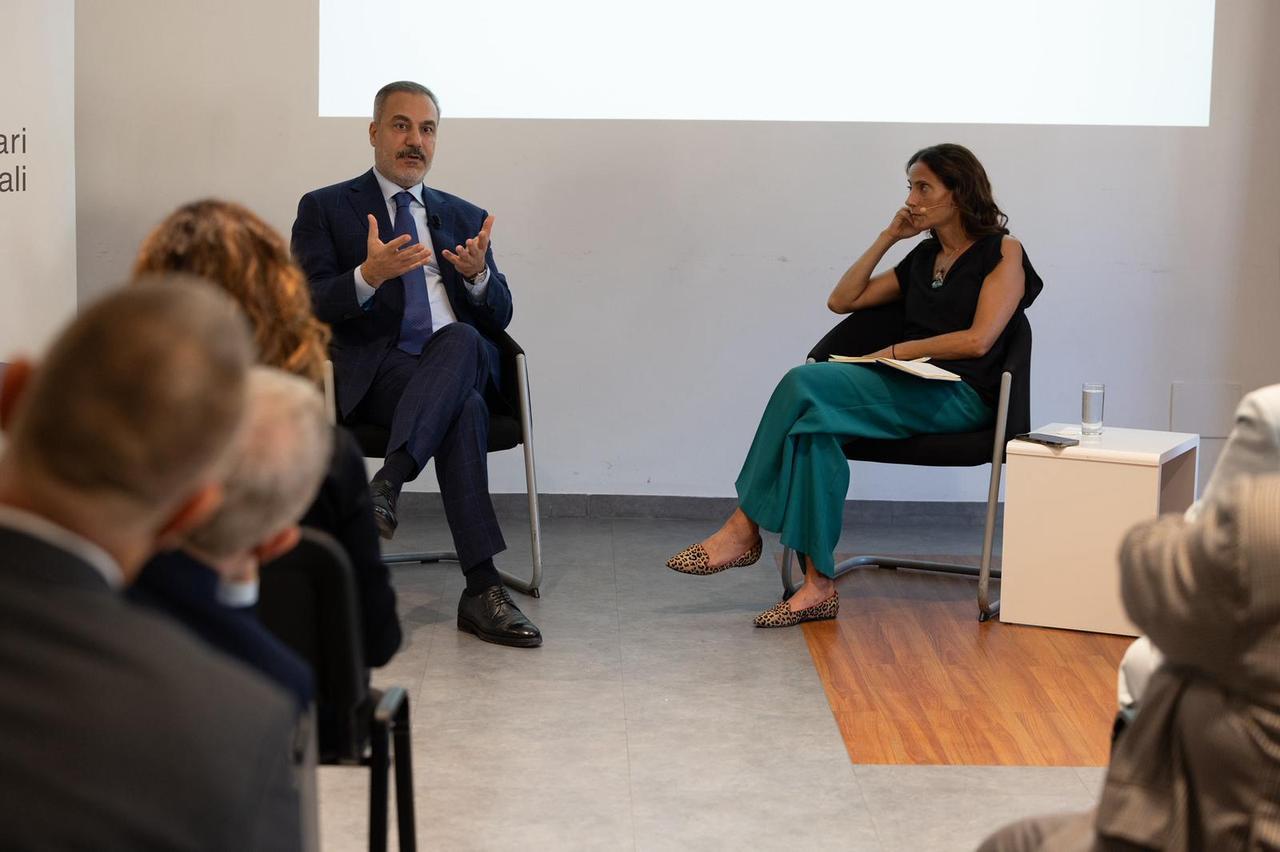 Foreign Minister Hakan Fidan (L) speaks at a conference organized by the Institute of International Affairs (IAI), in Rome, Italy, on Sept. 12, 2025. (Photo via Turkish Foreign Ministry)