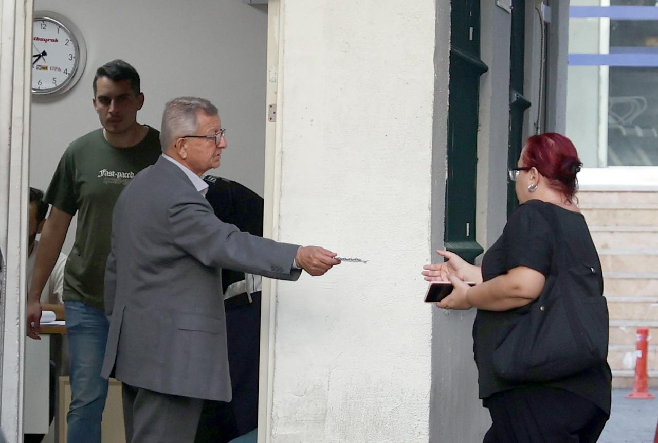 Bayrampasa Deputy Mayor Lutfi Kadiogullari (L) was brought to Bayrampasa State Hospital for a medical checkup in Istanbul, Türkiye, Sept. 13, 2025. (AA Photo)