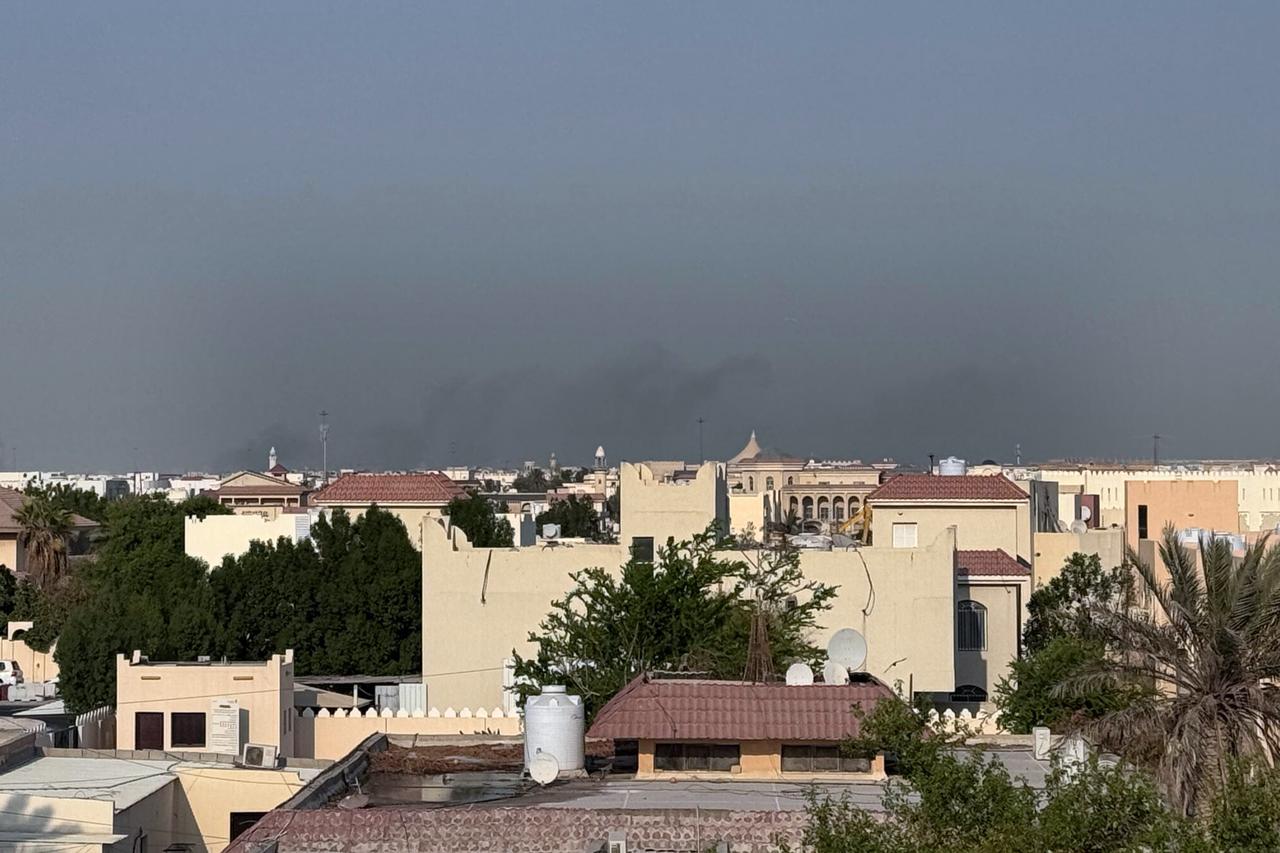 Smoke rises from behind residential areas after the explosions in Doha, Qatar on September 09, 2025. (AA Photo)