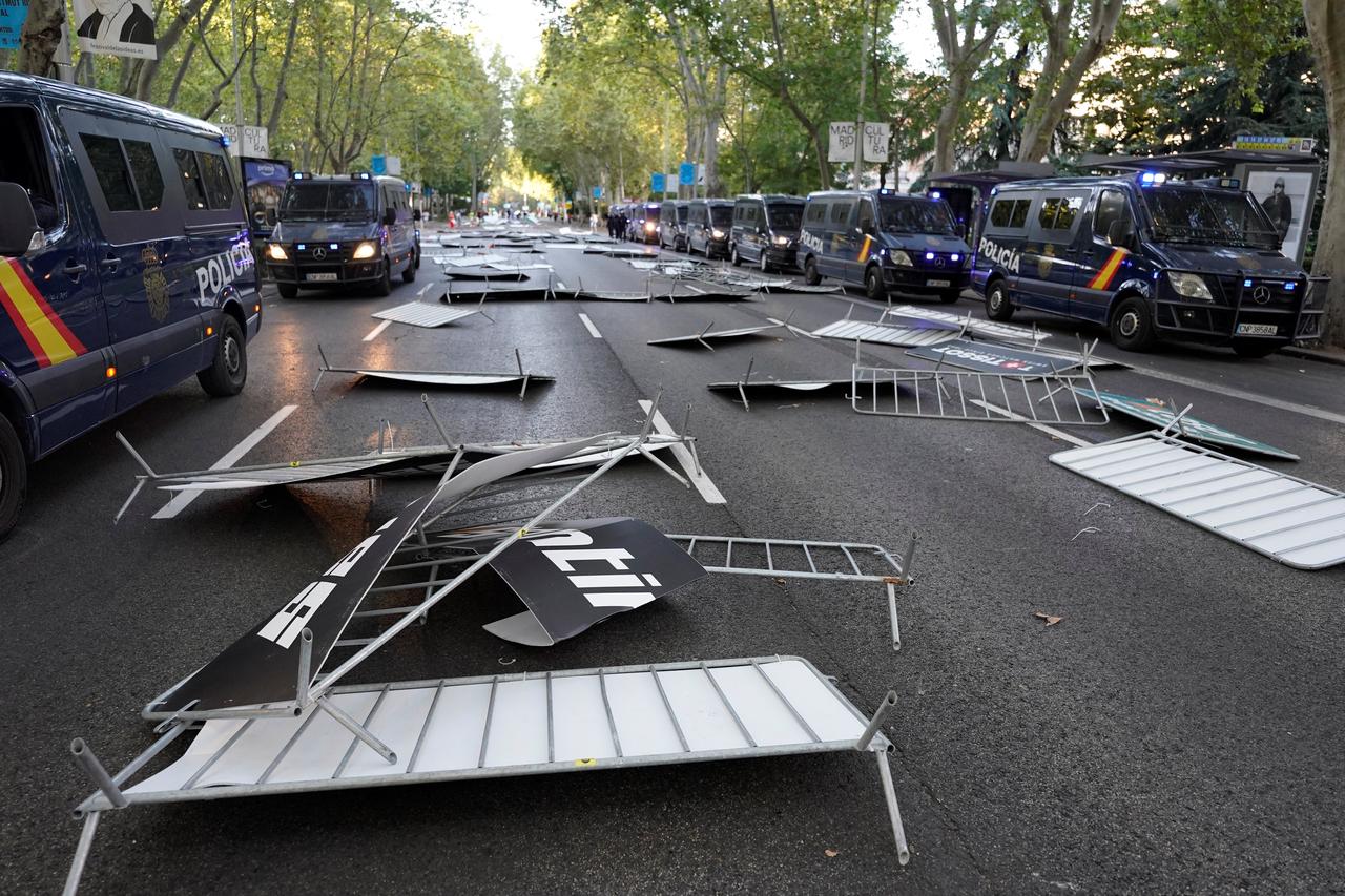 Barriers thrown down are seen after Pro-Palestinians protestors invaded the street during the 21st and last stage of the Vuelta a Espana 2025, in Madrid on Sep. 14, 2025. (AFP Photo)