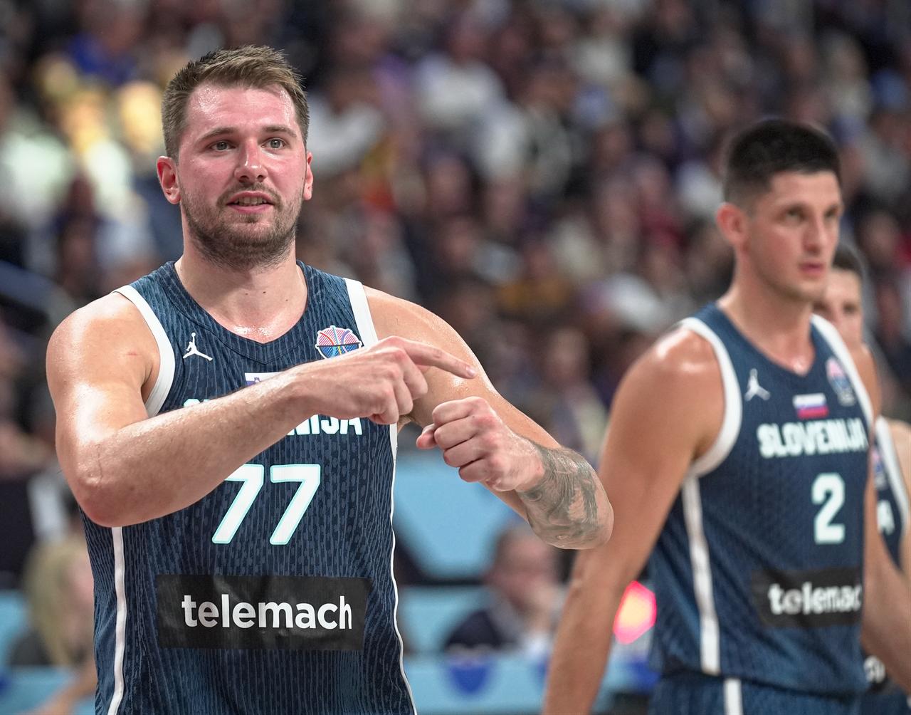 Luka Doncic (77) of Slovenia in action during the FIBA EuroBasket 2025 quarterfinal match between Germany and Slovenia at Riga Arena in Riga, Latvia, Sept. 10, 2025. (AA Photo)