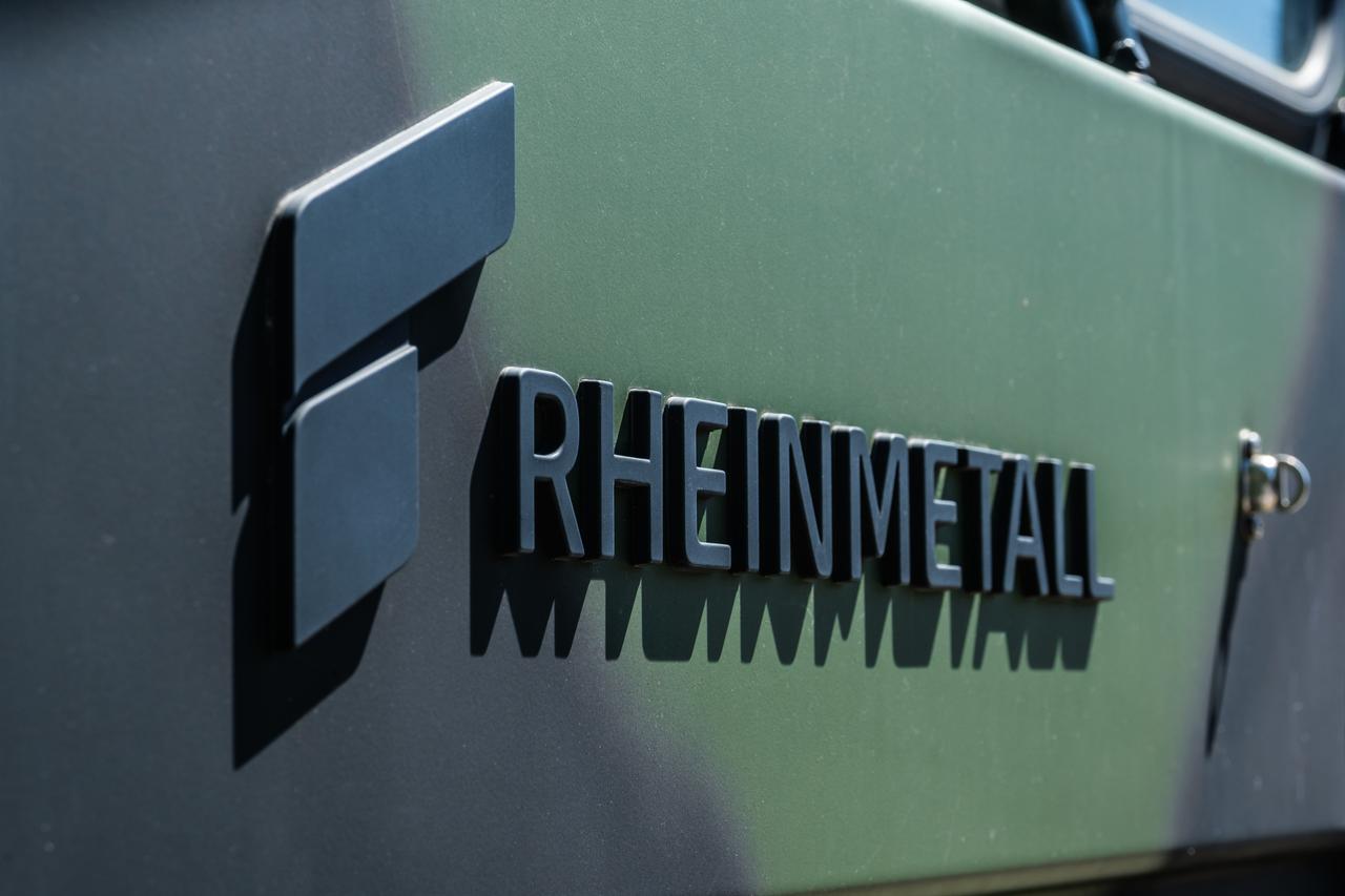 Rheinmetall lettering on Bundeswehr vehicle with camouflage paint. (Adobe Stock Photo)