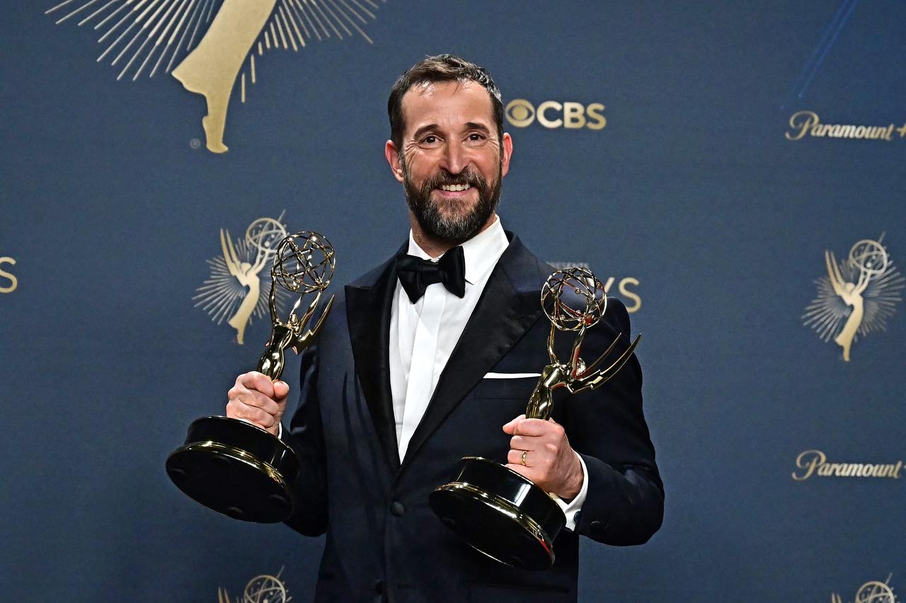 Noah Wyle poses with his Emmys for Outstanding Lead Actor and Outstanding Drama Series for The Pitt at the 77th Primetime Emmy Awards at the Peacock Theater in Los Angeles, September 14, 2025. (Photo by Frederic J. Brown / AFP)