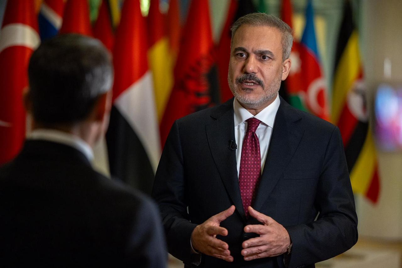 Foreign Minister Hakan Fidan gives an interview to the media after attending the OIC-Arab League Extraordinary Joint Summit of Foreign Ministers in Doha, Qatar, on Sept. 14, 2025. (AA Photo)