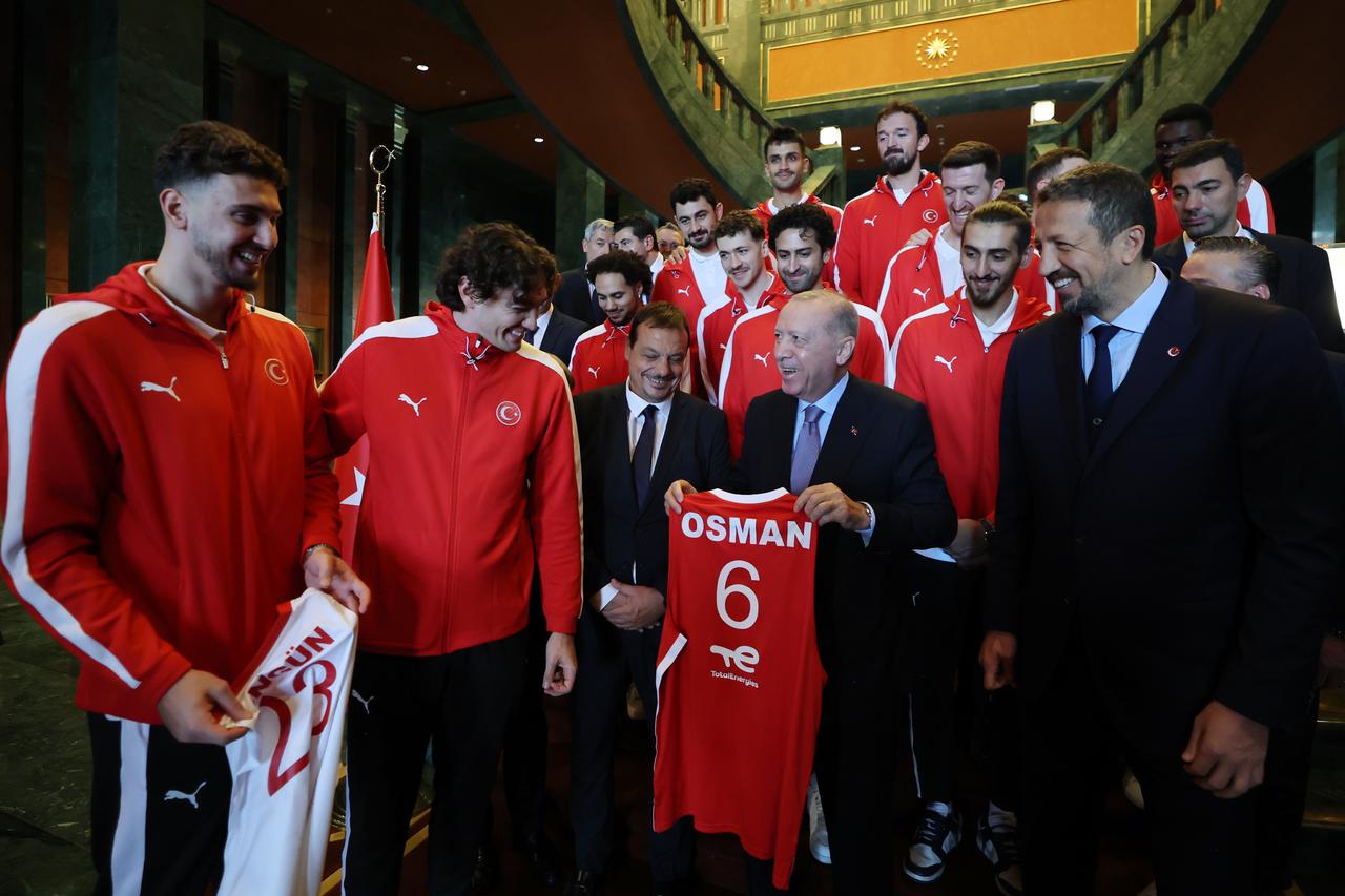 President Erdogan chats with players of Turkish National Basketball Team after winning a silver medal in FIBA EuroBasket 2025, in Ankara, Sept. 16, 2025. (Photo via Turkish Presidency/Murat Cetinmuhurdar)