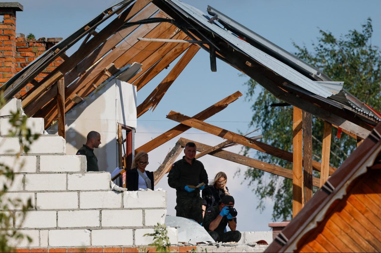 Police and army inspect damage to a house destroyed by debris from a shot down Russian drone in the village of Wyryki-Wola, eastern Poland, September 10, 2025. (AFP Photo)