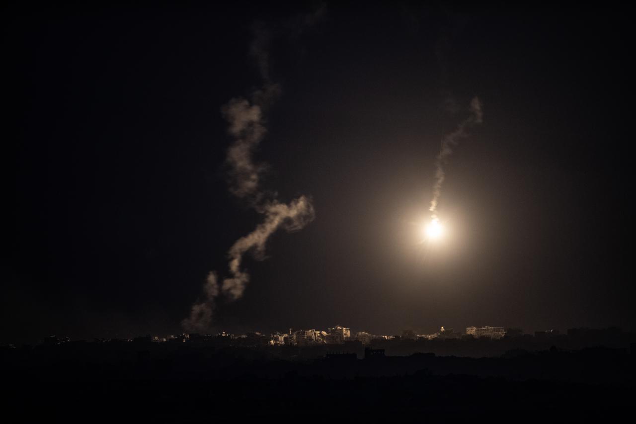 Smoke rises and an illumination flare is seen from the border region as Israel's attacks on the Gaza Strip continue unabated in Israel, on September 15, 2025. (AA Photo)