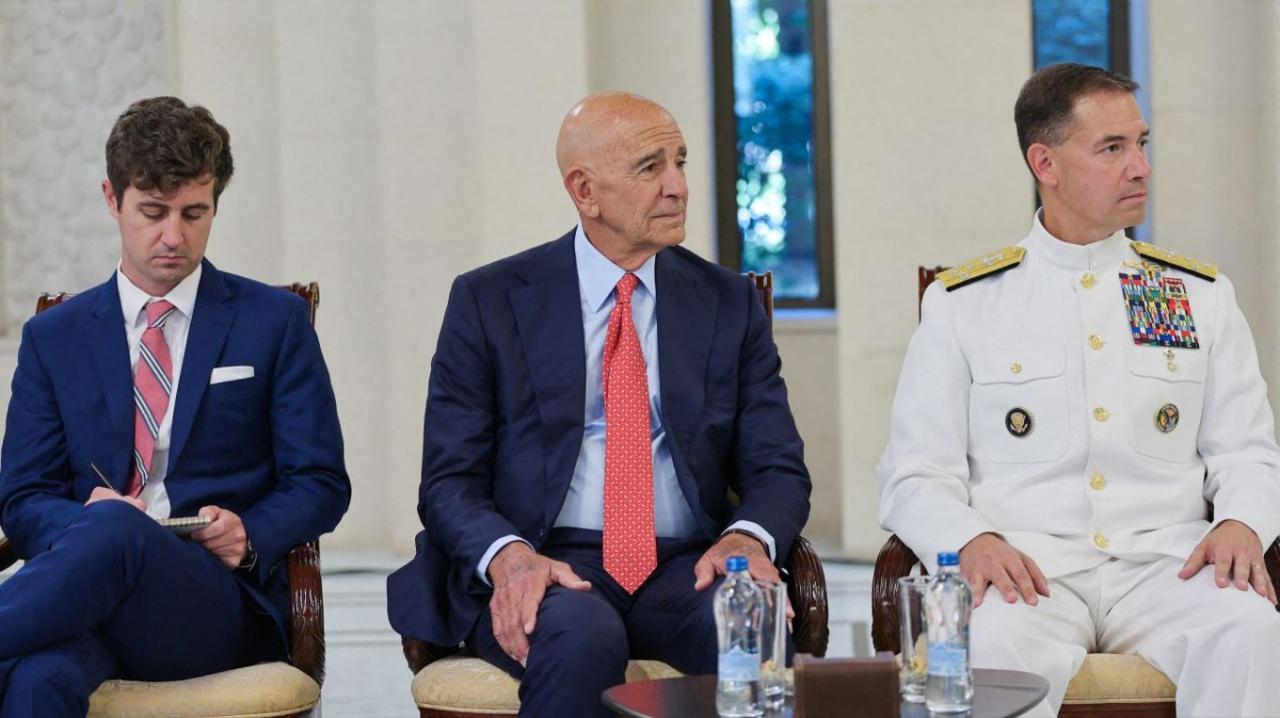 A handout picture released by the official Syrian Arab News Agency (SANA) shows the new head of the US military's Central Command Admiral Brad Cooper (R) and US special envoy for Syria Tom Barrack (C) meeting with Syria's interim President in Damascus, Syria on Sept. 12, 2025. (AFP Photo / HO / SANA)
