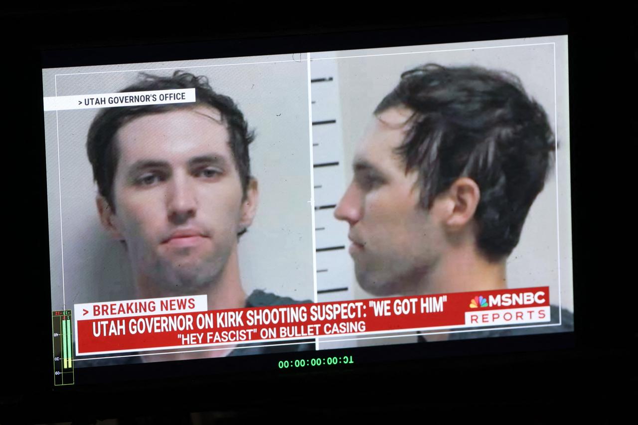 A TV monitor displays a picture of Tyler Robinson, the suspect of killing Charlie Kirk in Orem, Utah, on September 12, 2025. (AFP Photo)