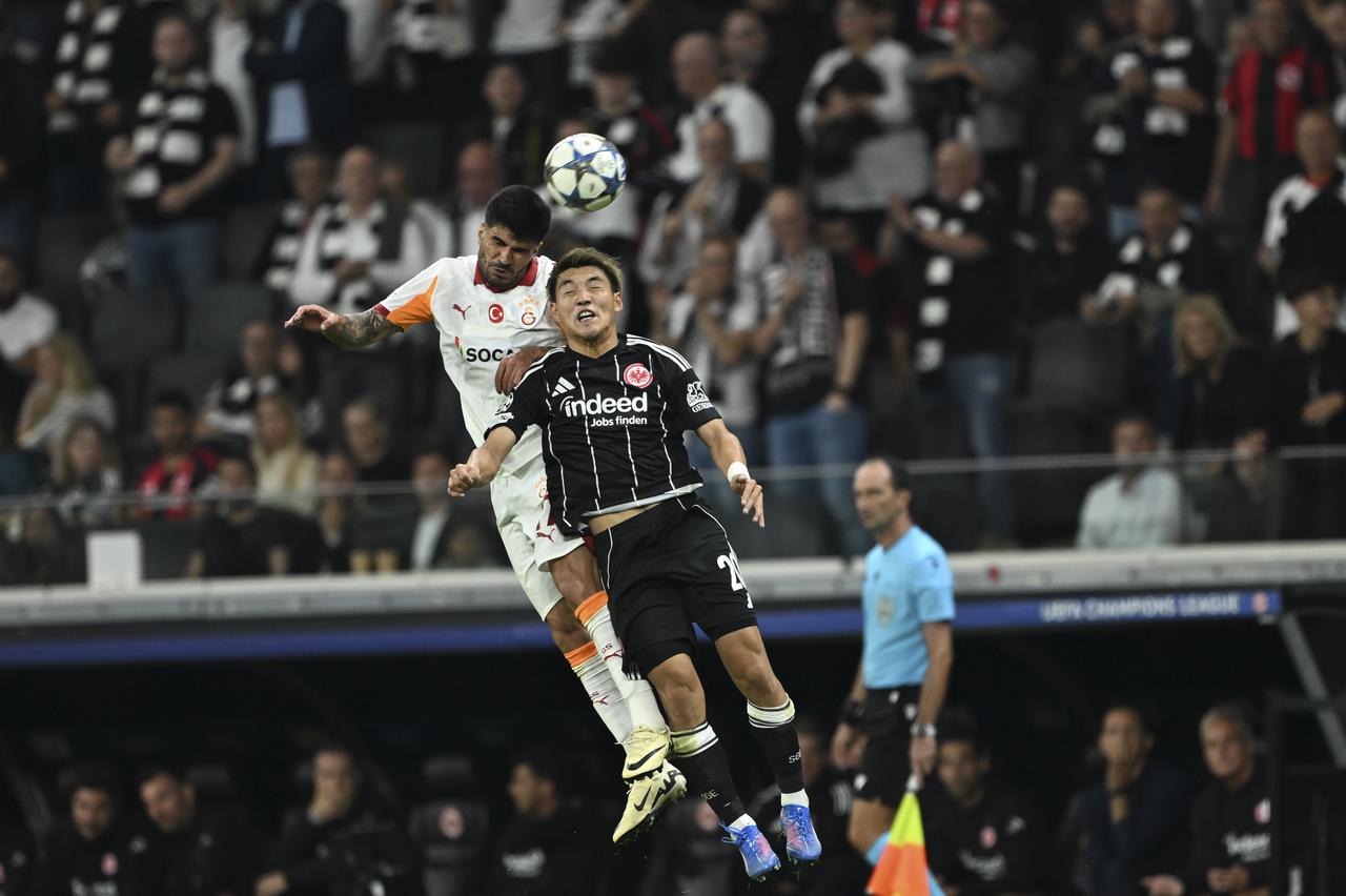 Eren Elmali (17) of Galatasaray in action against Ritsu Doan (20) of Eintracht Frankfurt during the UEFA Champions League match between Eintracht Frankfurt and Galatasaray at Deutsche Bank Park in Frankfurt, Germany, on Sep. 18, 2025. (AA Photo)