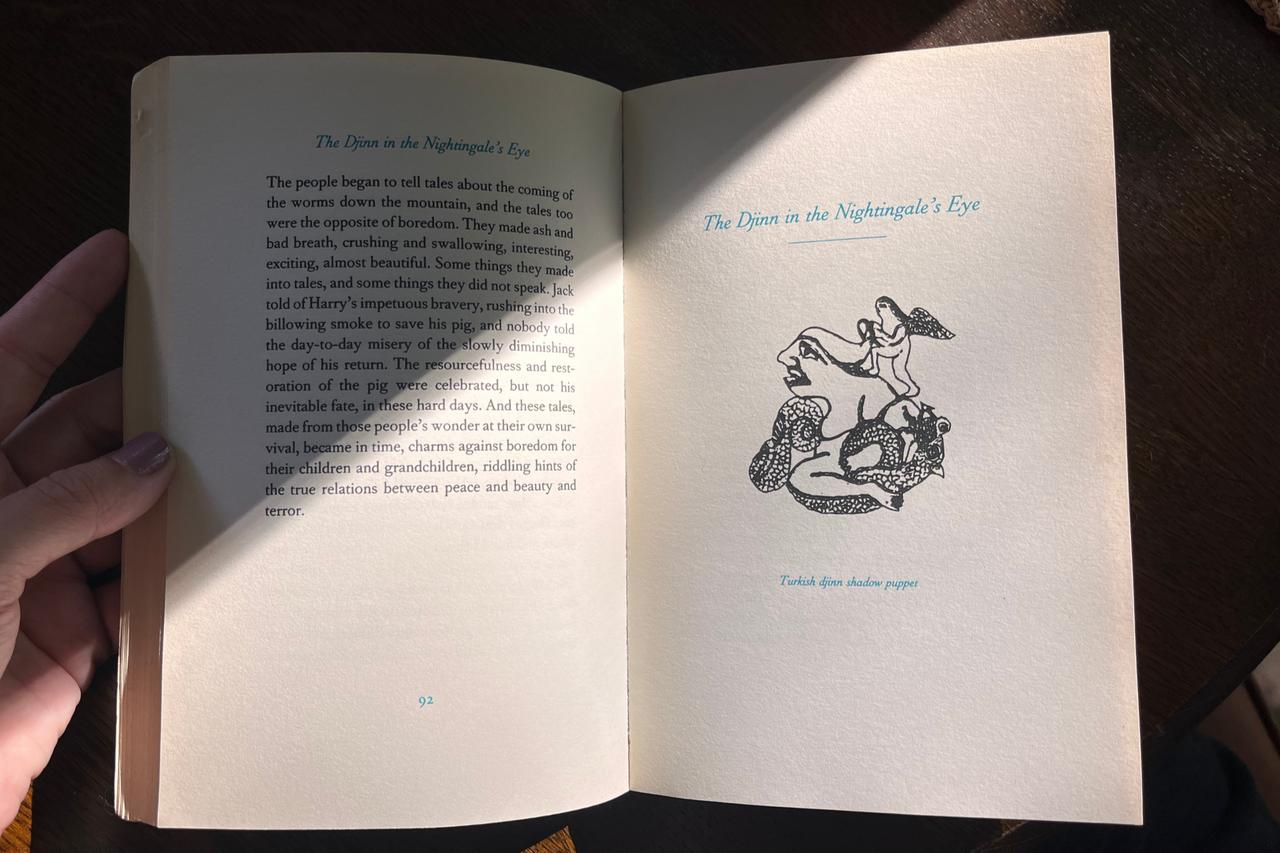 Inside pages of "The Djinn in the Nightingale’s Eye," featuring an illustration titled "Turkish djinn shadow puppet", Utrecht, Netherlands, September 19, 2025. (Photo by Selin Hacialioglu/Türkiye Today)