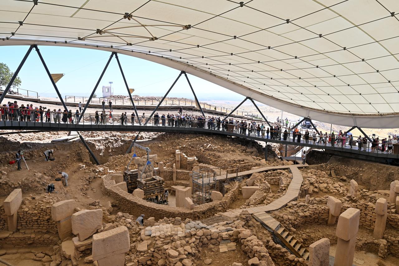 Visitors watch ongoing excavations at Gobeklitepe from the site’s observation platform, Sanliurfa, Türkiye, September 19, 2025. (AA Photo)