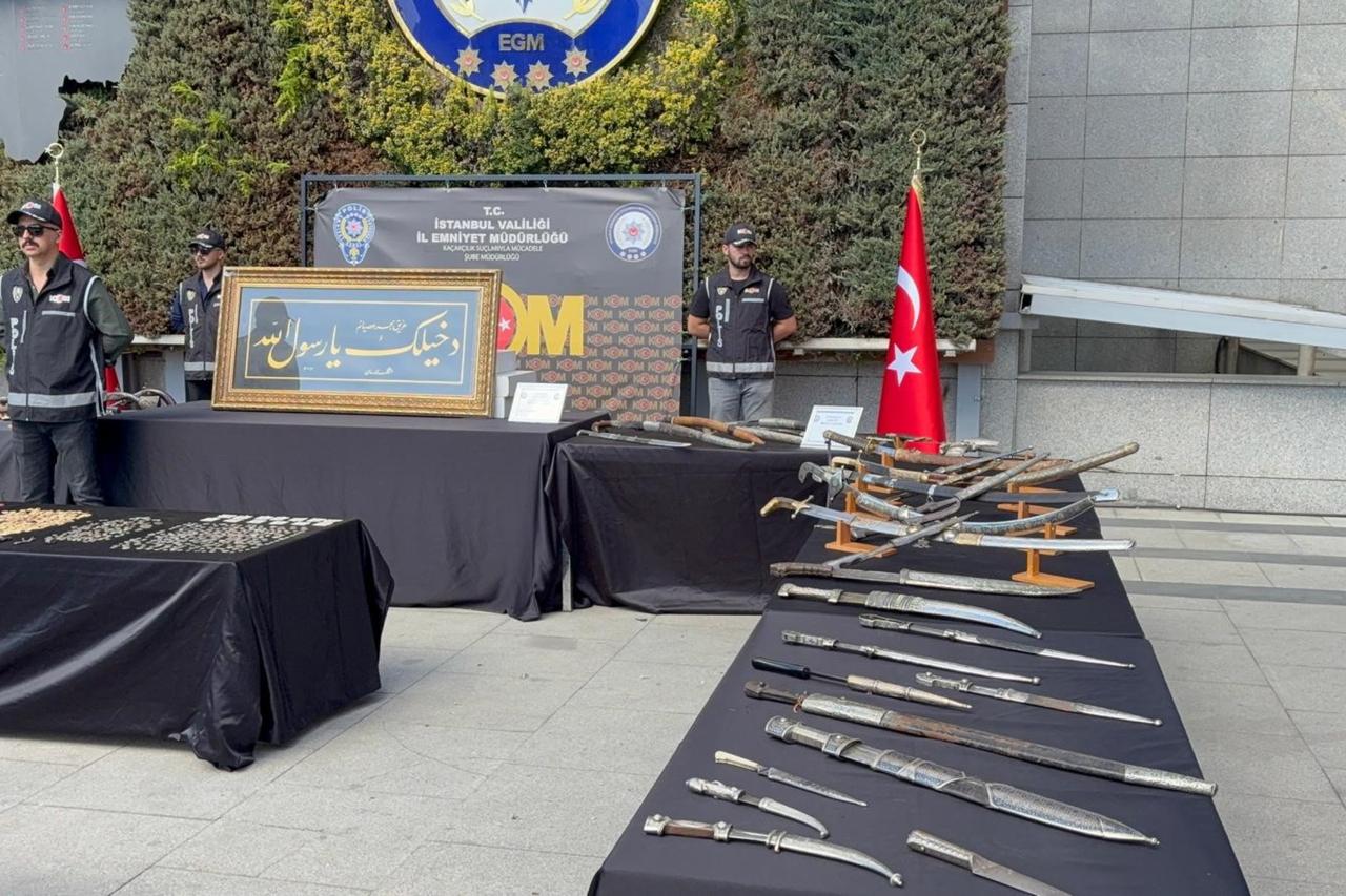 Silver goblets, ritual objects, and other Ottoman-era artifacts recovered from smugglers on display at Istanbul Police Headquarters, Istanbul, Türkiye, September 19, 2025. (IHA Photo)