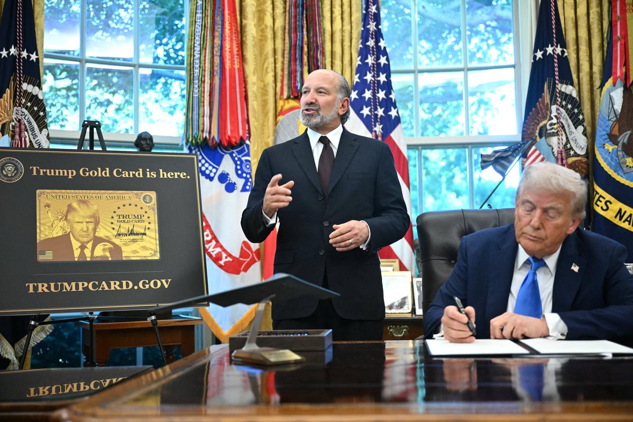 US Commerce Secretary Howard Lutnick (L) speaks as President Donald Trump looks on in the Oval Office of the White House in Washington, DC, September 19, 2025. (AFP Photo)