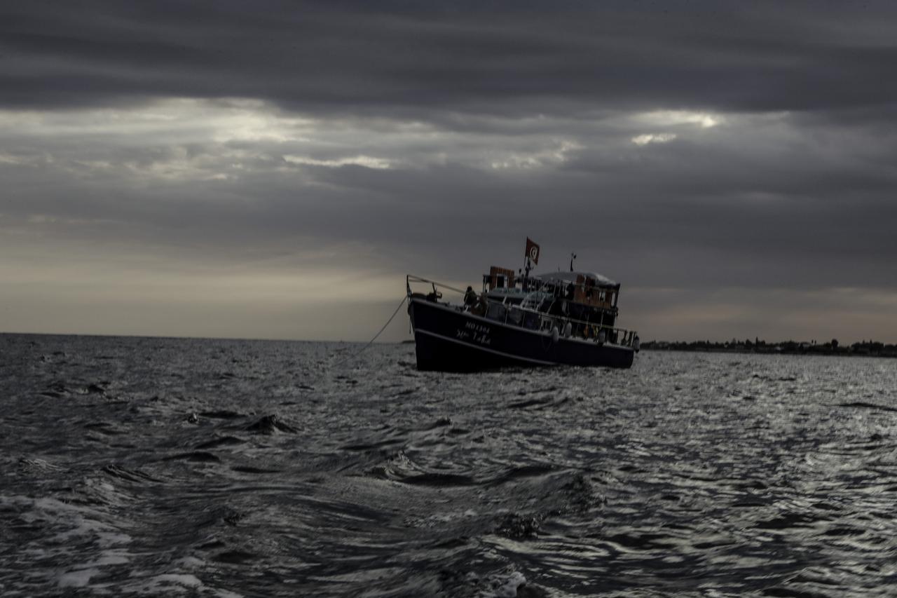 The crew of volunteers aboard in the flagship of the Global Sumud Fleet, the vessel named ‘Family’, continue their daily lives as the vessel anchors in Porto Palo Bay in Sicily, Italy on Sep. 18, 2025. (AA Photo)