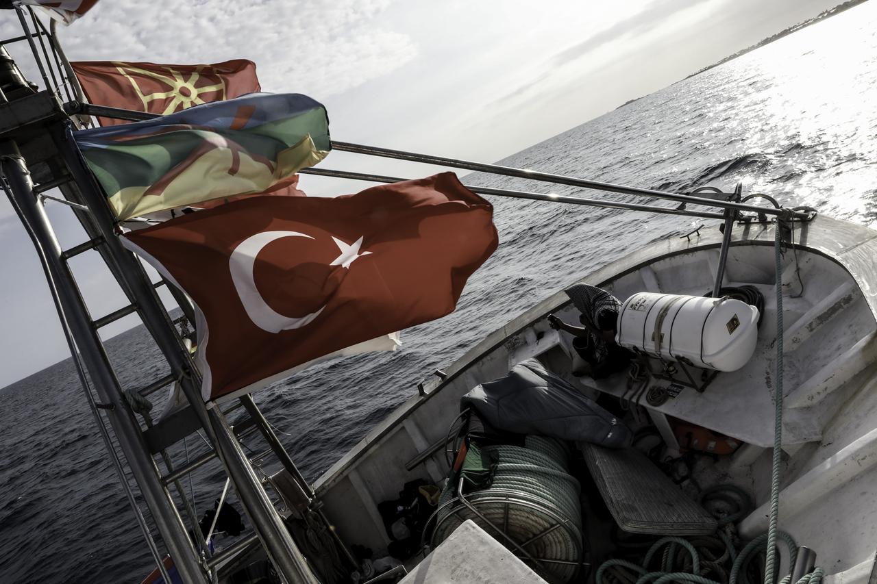 A view of flags hung in the flagship of the Global Sumud Fleet, the vessel named ‘Family’, as the vessel anchors in Porto Palo Bay in Sicily, Italy on September 18, 2025. (AA Photo)