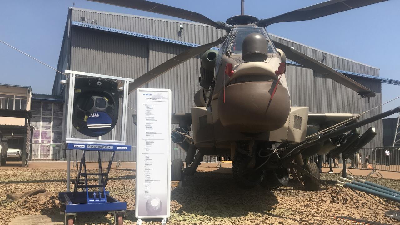 Aselsan's MEROPS system, developed at its South Africa office, showcased on the locally produced Rooivalk attack helicopter at the Africa Aerospace and Defence (AAD 2022) exhibition, Sept. 24, 2022. (AA Photo)