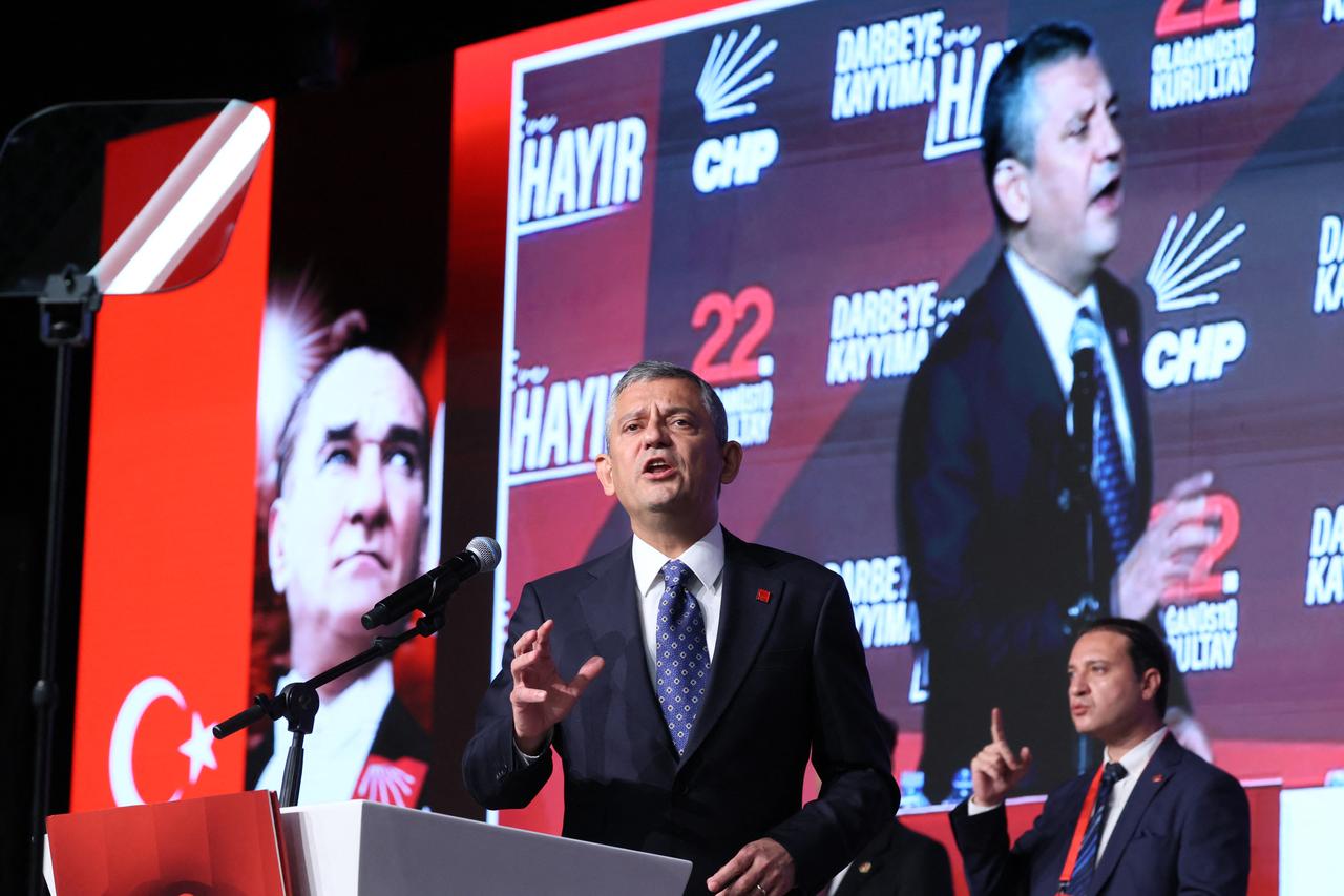 Leader of Türkiye's main opposition party, Republican People's Party (CHP), Ozgur Ozel, speaks on stage in Ankara on September 21, 2025. (AFP Photo)