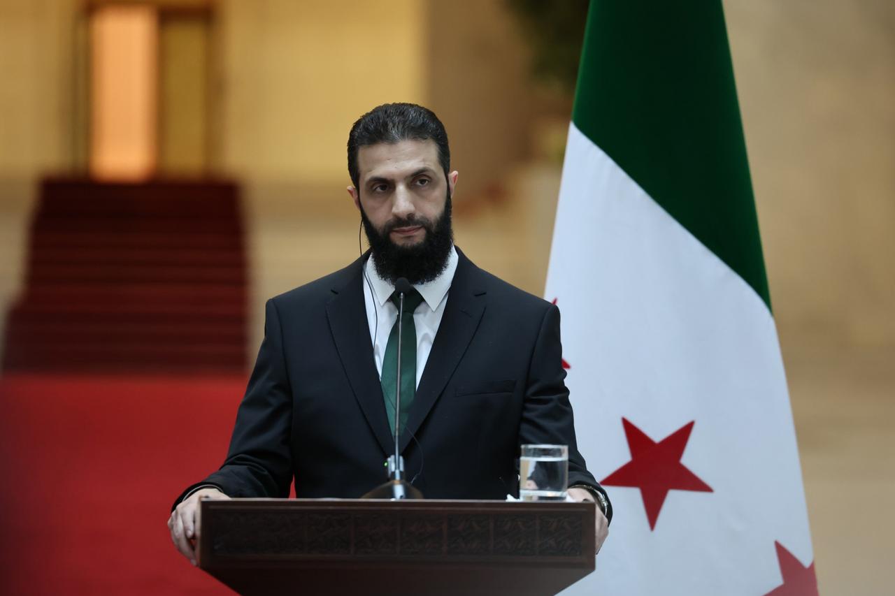 Syrian President Ahmed al-Sharaa delivers a speech during a joint press conference with Turkish Foreign Minister Hakan Fidan in Damascus, Syria, December 22, 2024. (AA Photo)