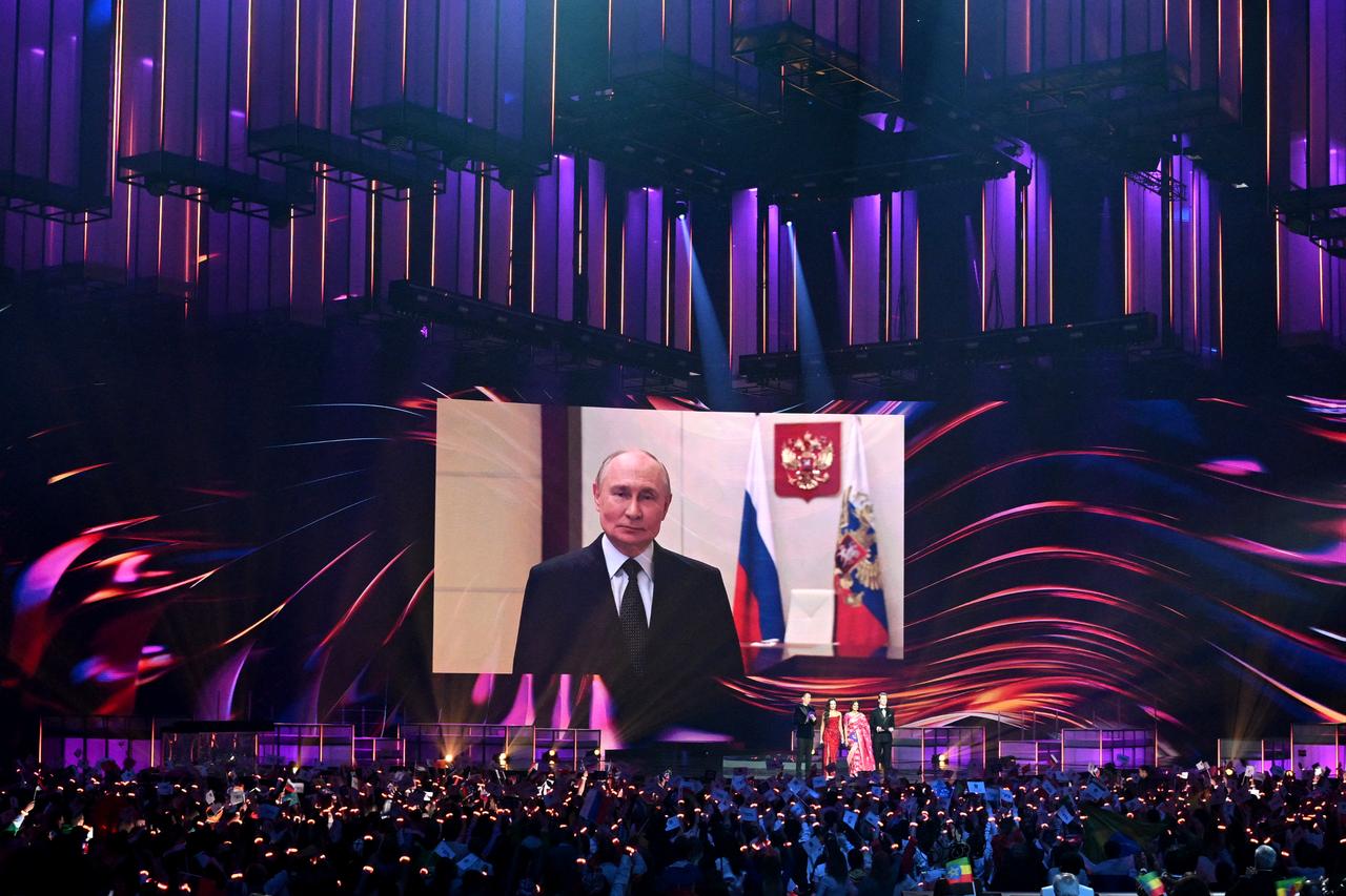 An image of Russian President Vladimir Putin appears on the main stage screen at the Intervision Song Contest held at Moscow’s Live Arena, September 20, 2025. (AFP Photo)