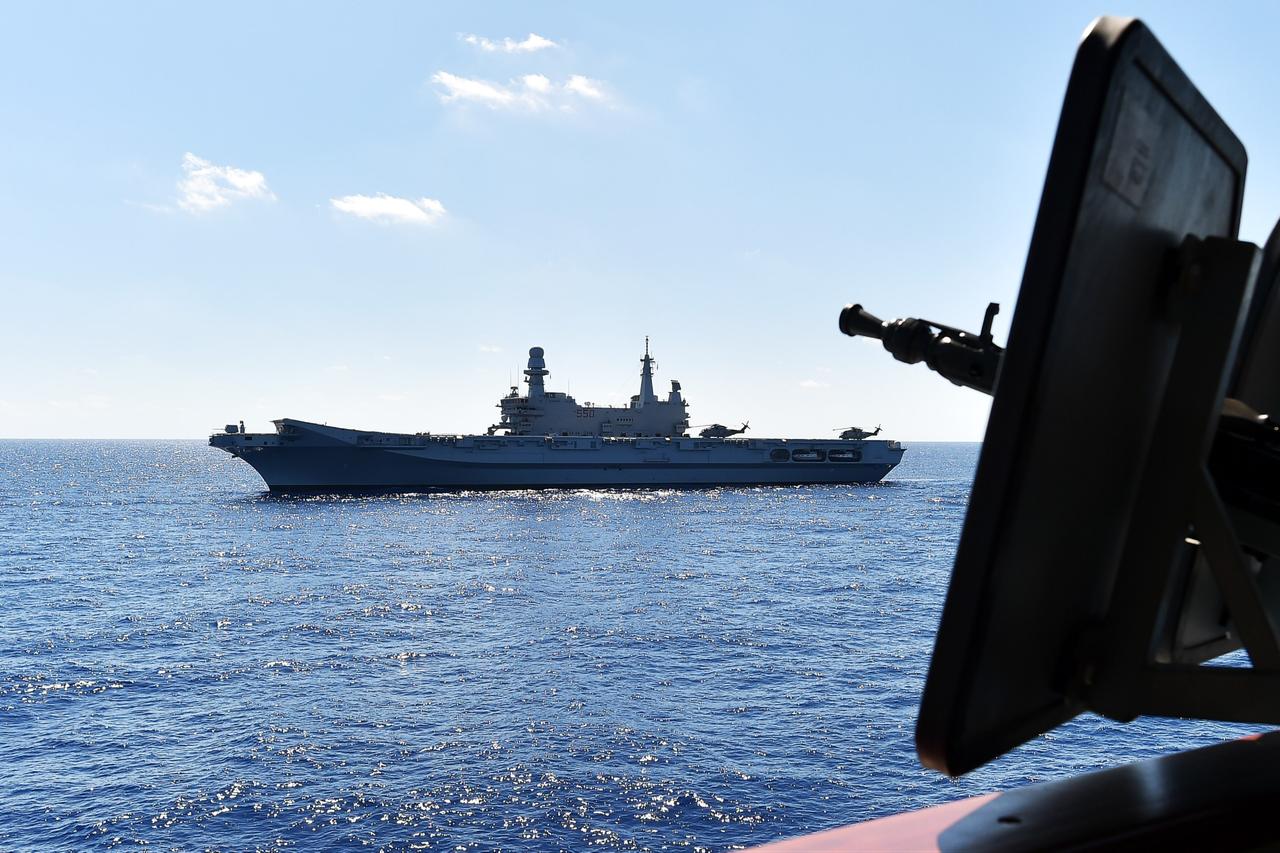 The Italian navy carrier Cavour is seen from German navy frigate ship Werra, as it sails in the Mediterranean Sea, close to the Libyan territorial waters, Sept. 23, 2015. (AFP Photo)