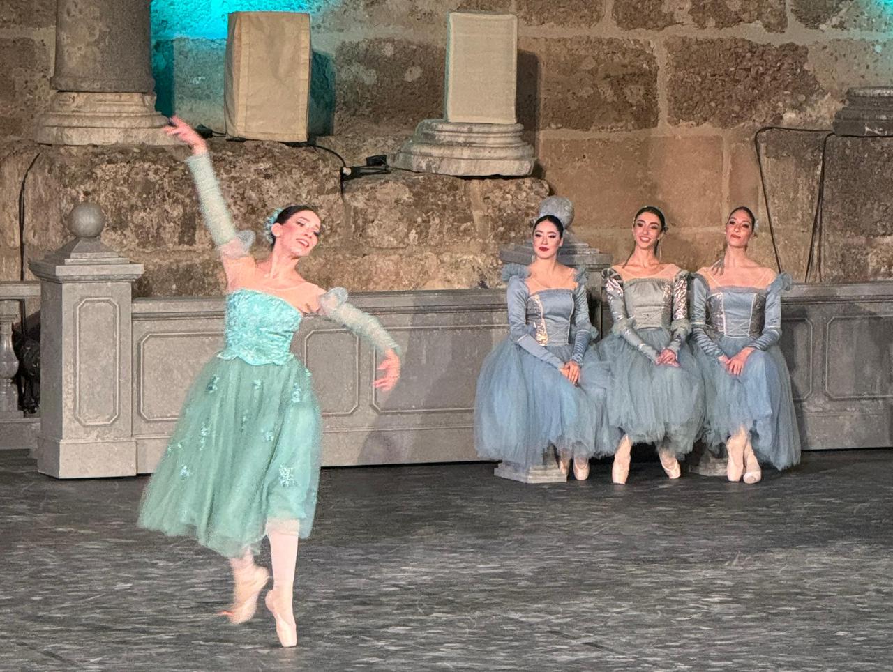 A ballerina performs a solo scene from Swan Lake at the ancient Aspendos Theater as part of the 32nd International Opera and Ballet Festival in Antalya, Türkiye, Sept. 21, 2025. (AA Photo)