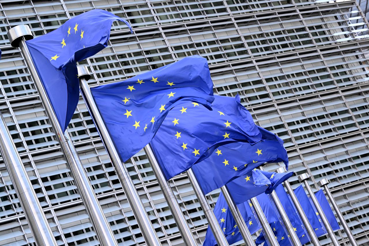 This photograph shows European flags outside the EU headquarters in Brussels on September 11, 2025. (AFP Photo)