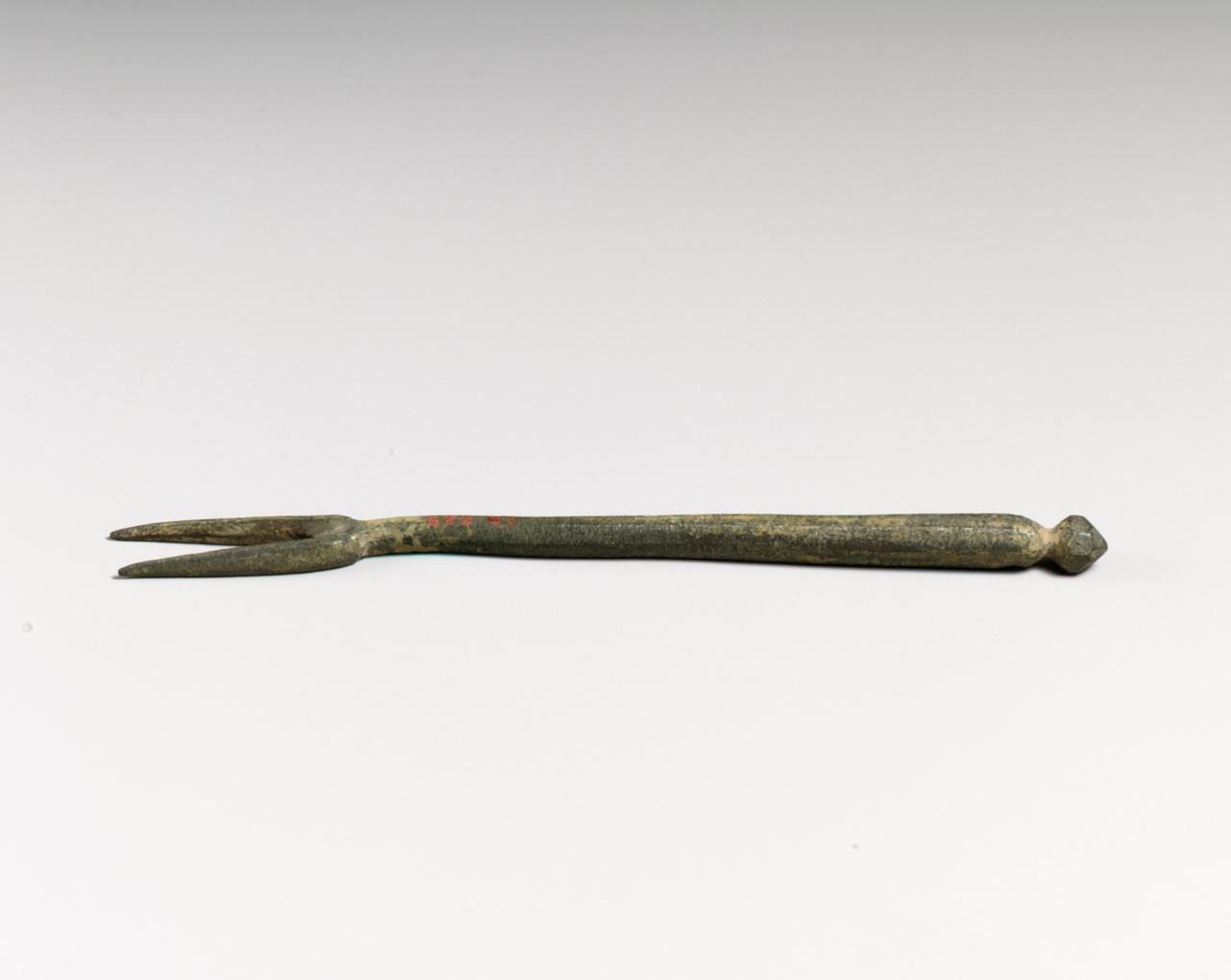 Bronze two-pronged fork, Roman Cyprus, ca. 1st–3rd century AD. (Photo via Metropolitan Museum of Art)