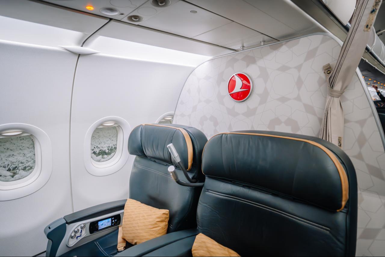 Luxury business-class seats are seen inside a Turkish Airlines aircraft. (Adobe Stock Photo)