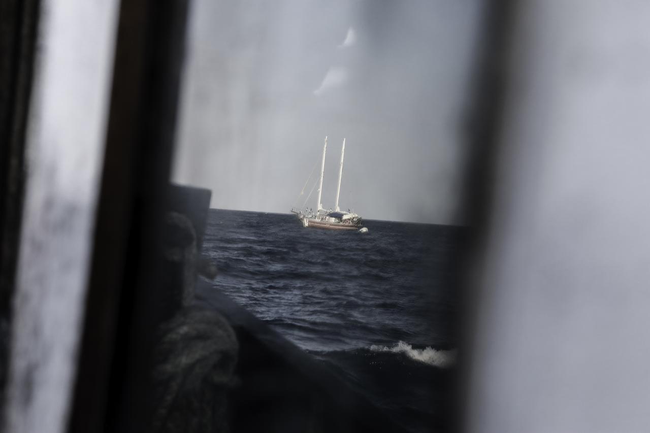 The crew of volunteers aboard in the flagship of the Global Sumud Fleet, the vessel named ‘Family’, continue their daily lives as the vessel anchors in Porto Palo Bay in Sicily, Italy on Sept. 18, 2025. (AA Photo)