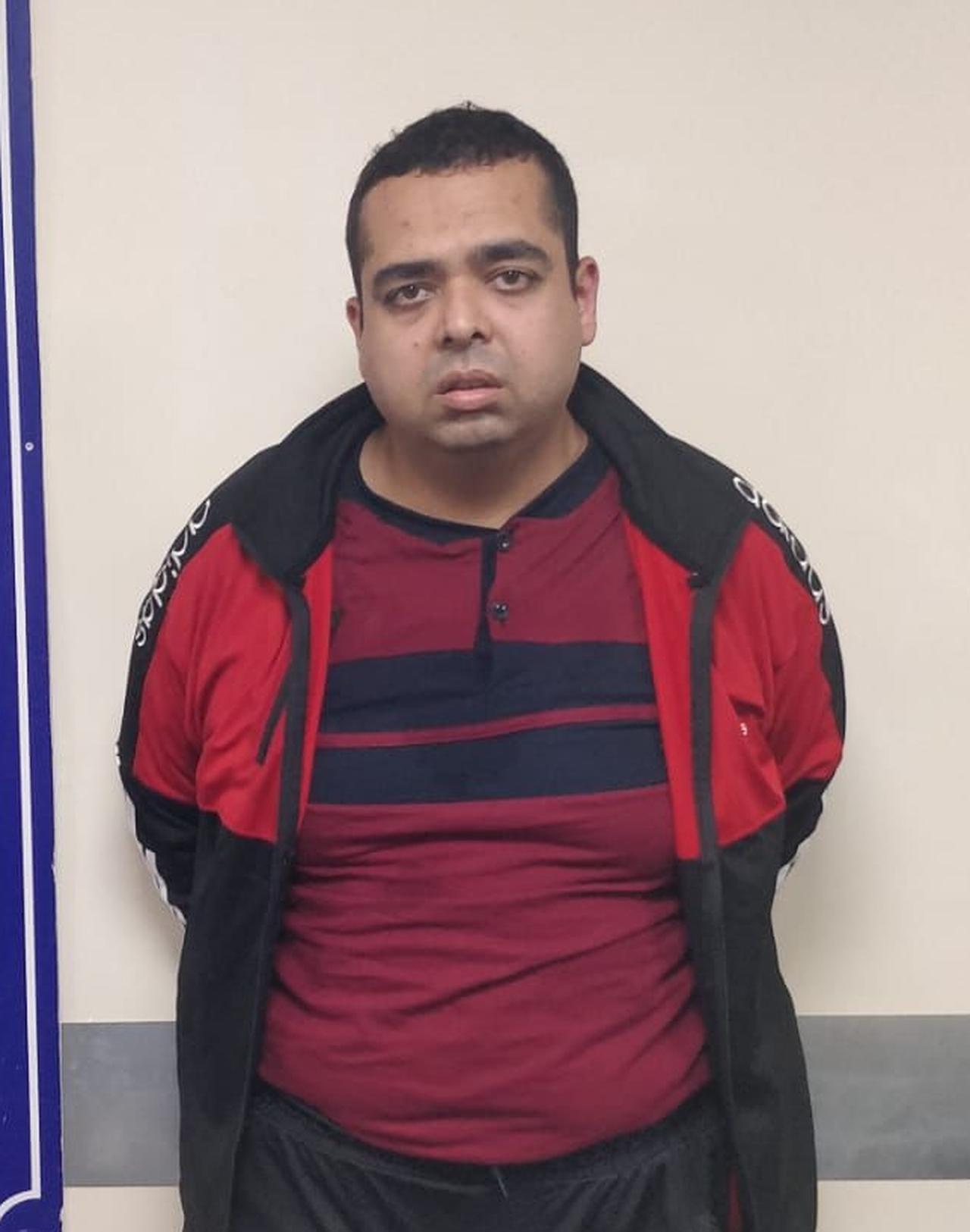 Photo shows a foreign national suspected of committing theft while posing as a police officer in Istanbul, Türkiye on Sept. 24, 2025. (AA Photo)