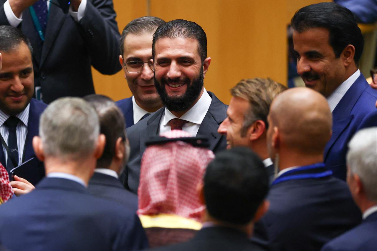 Syrian President Ahmed al-Sharaa (top, C) looks on as France's President Emmanuel Macron arrives for a United Nations Summit on Palestinians at UN headquarters during the United Nations General Assembly (UNGA) in New York, September 22, 2025. (AFP Photo)