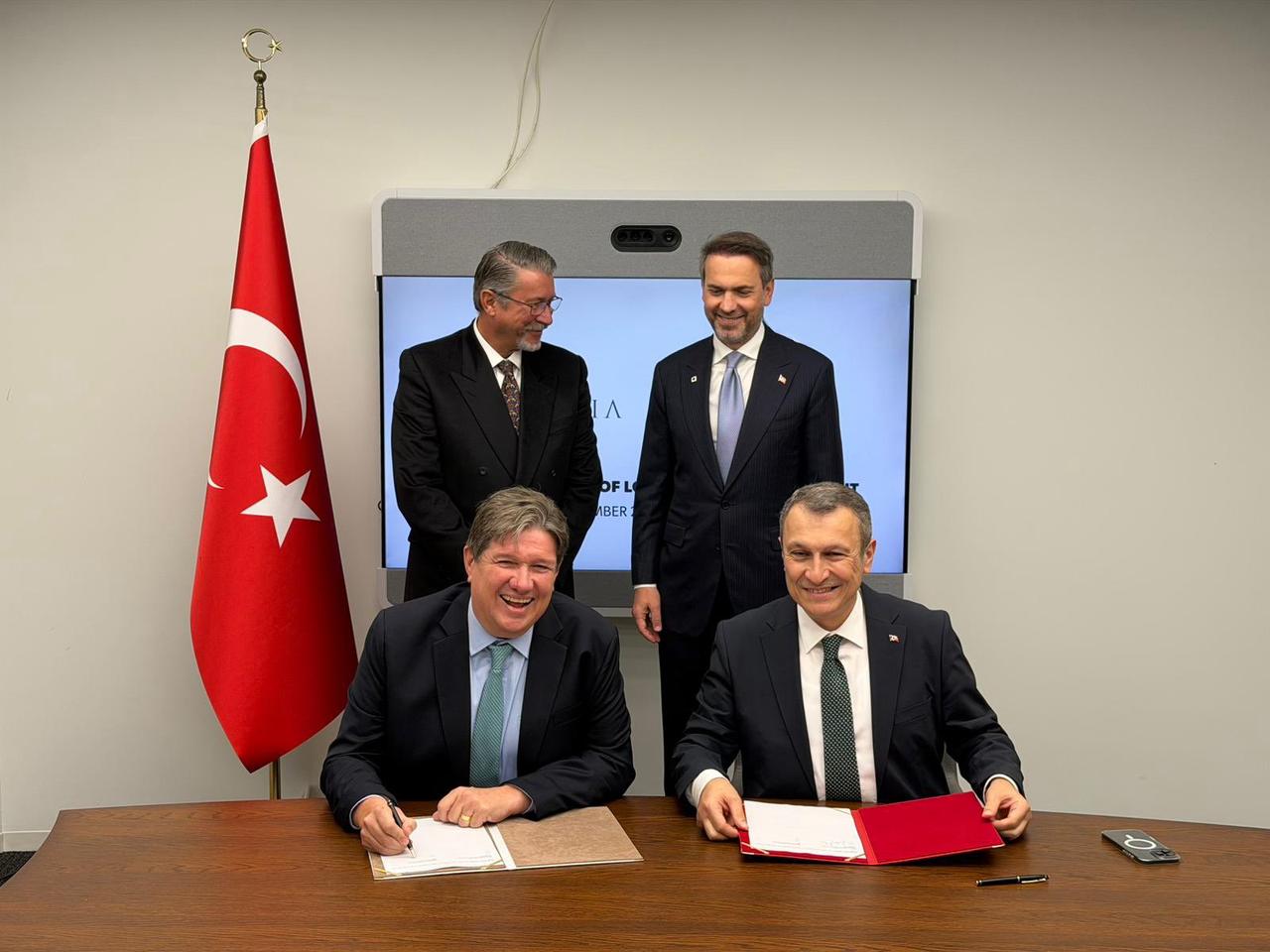 Türkiye’s Energy Minister Alparslan Bayraktar (back right) attends the signing ceremony where state-run BOTAS and U.S.-based Mercuria conclude a 20-year LNG supply agreement in New York, US, September 24, 2025. (Photo via X/@aBayraktar1)