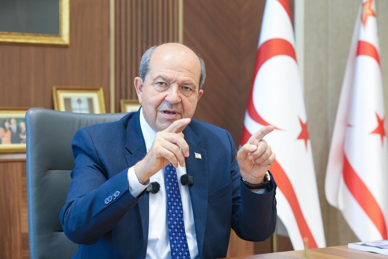 Turkish Republic of Northern Cyprus (TRNC) President Ersin Tatar speaking to a correspondent before his meeting with the Greek Cypriot leader. (AA Photo)
