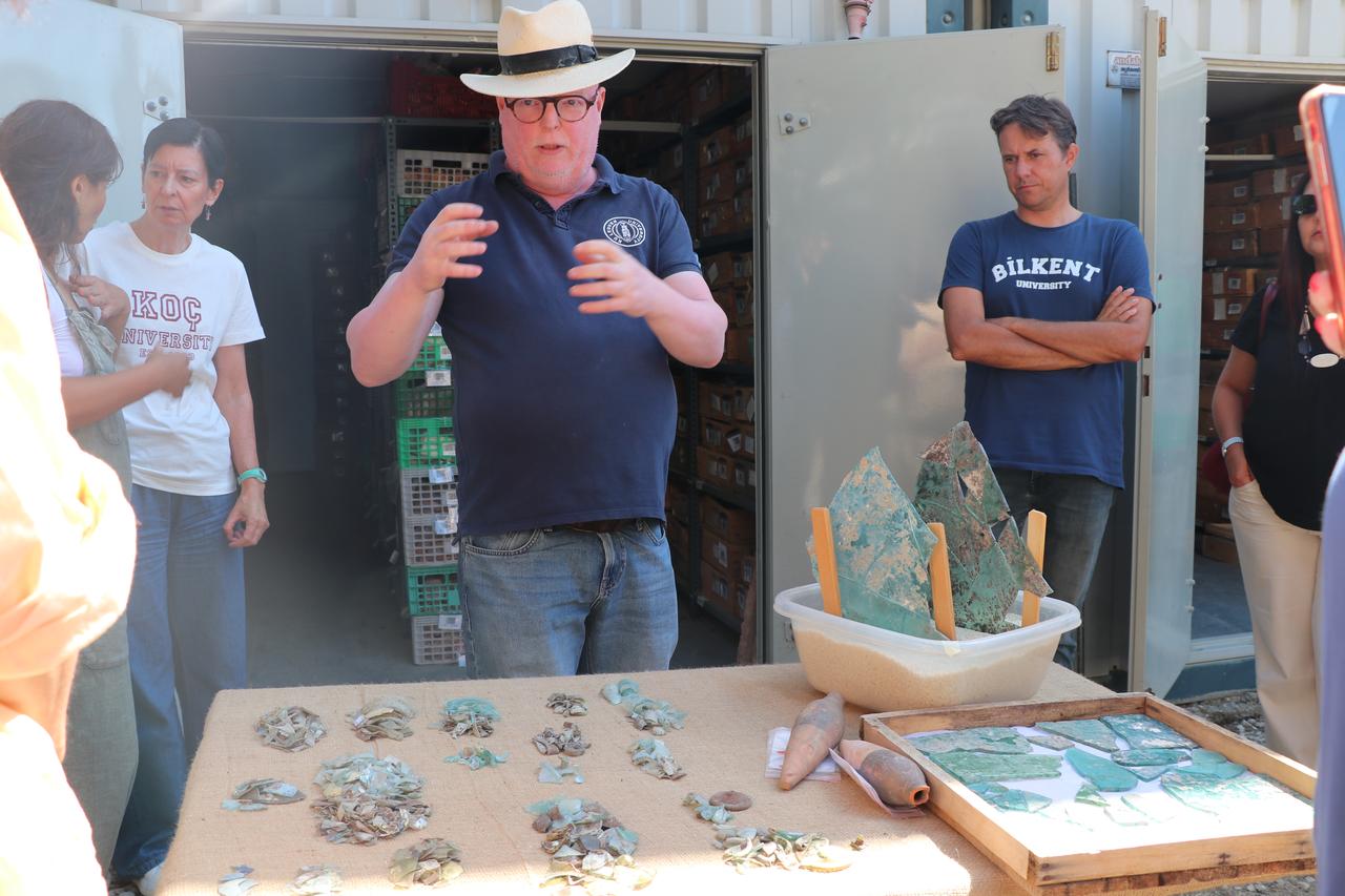 Professor Jeroen Poblome of KU Leuven explains findings from the Roman bath excavations at Sagalassos, Burdur, Türkiye, Sept. 19, 2025. (AA Photo)