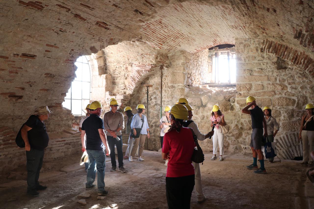 Visitors tour the vaulted interior of the ancient Roman bath during ongoing excavations at Sagalassos, Burdur, Türkiye, Sept. 19, 2025. (AA Photo)