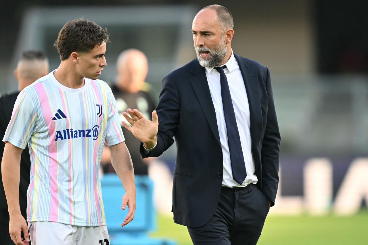 Juventus' Turkish forward Kenan Yildiz listens to Juventus' Croatian coach Igor Tudor before the Italian Serie A football match between Hellas Verona and Juventus at the Marcantonio Bentegodi stadium in Verona, Italy, Sept. 20, 2025. (AFP Photo)