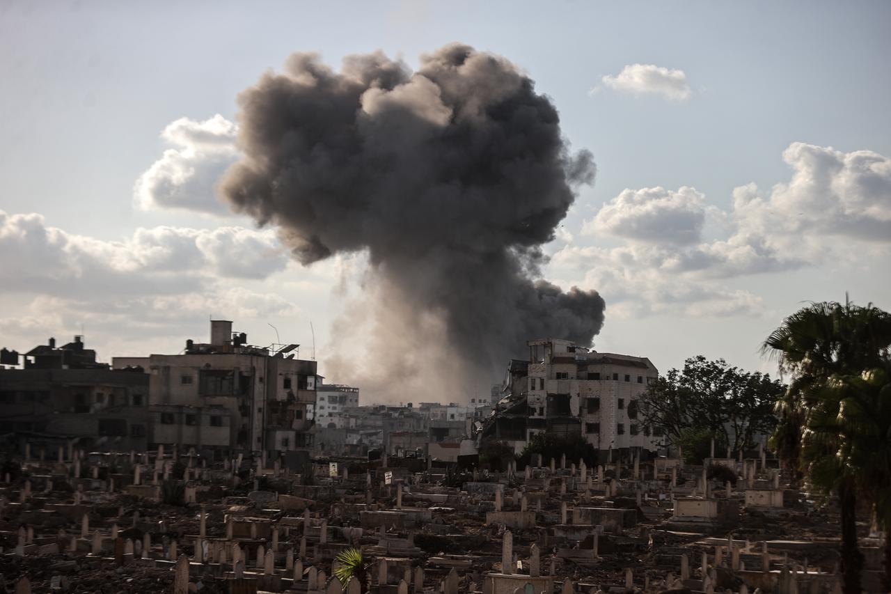 Smoke rises among the residential buildings following Israeli attacks on Gaza City, Gaza on Sept. 25, 2025. (AA Photo)