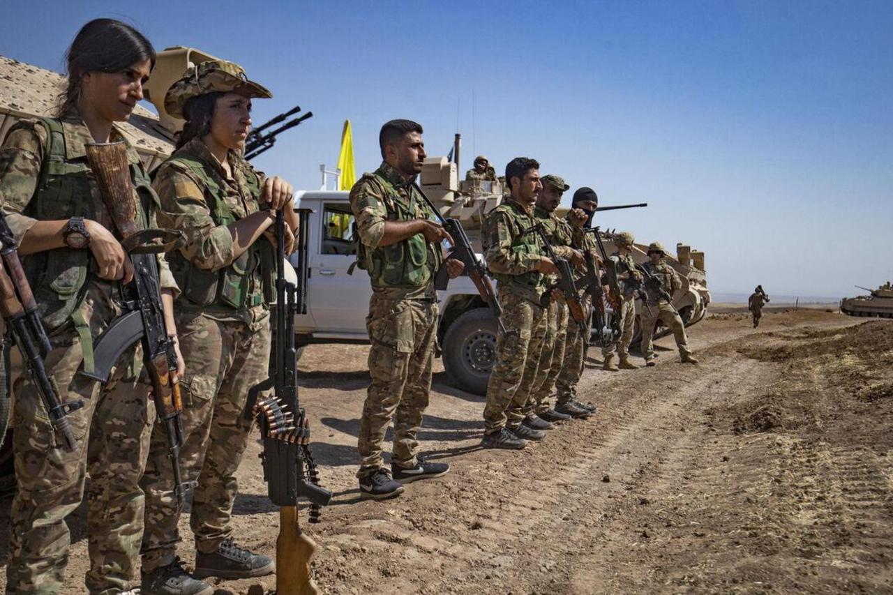 Terrorist organization YPG-led SDF members attend a joint military exercise with forces of US coalition in Syrias northeastern al-Hasakah province, Sept. 7, 2022. (AFP Photo)