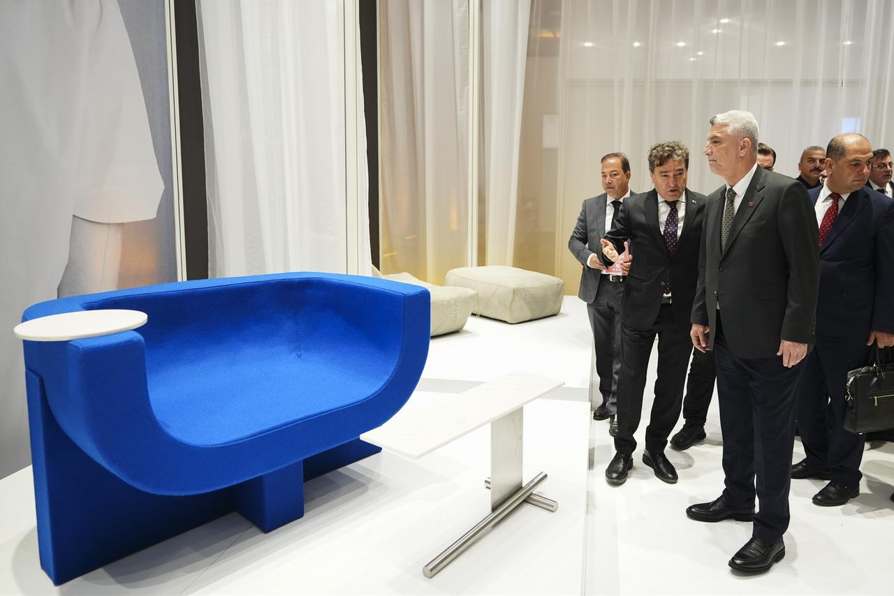 Trade Minister Omer Bolat (R) visits the "Istanbul Furniture Design Fair - Furnishings and Design Istanbul" at the Istanbul Fair Center, Sept. 26, 2025. (AA Photo)