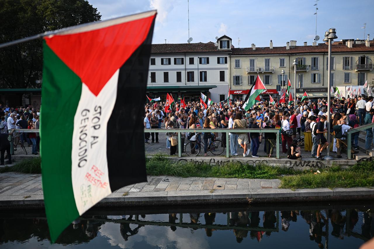 Pro-Palestinian supporters gather after two vessels of the International aid initiative Global Sumud Flotilla, carrying aid and pro-Palestinian activists including Greta Thunberg, were reportedly hit by a drone in the Tunis port, in Milan, Italy, Sept. 12, 2025. (AFP Photo)