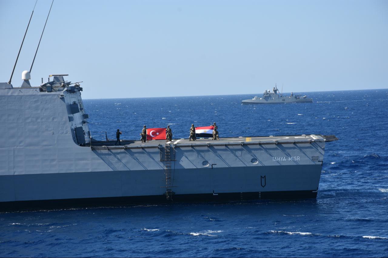 Military personnel raise Turkish and Egyptian flags on a ship during the Türkiye-Egypt Sea of ​​Friendship-2025 Exercise, in Mugla, Türkiye, Sept. 25, 2025. (AA Photo)